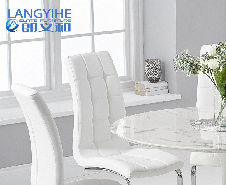 mesa de jantar redonda de mármore branca de 120cm e estofado jantando a cadeira
